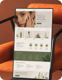 A tablet showing a generated skincare brand website.